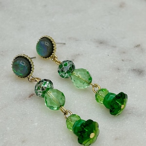 Custom made vintage earrings with emerald and light green glass beads, AB faceted Czech glass, and decorative glass posts, 2”