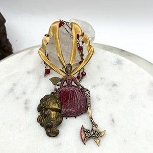 Marie Antoinette whimsical figural in brass moveable axe and head guillotine red glass bead upcycled necklace