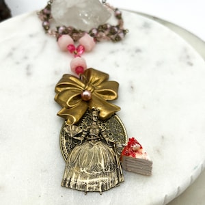 Marie Antoinette whimsical figural in brass moveable piece of artisan clay cake acrylic bead upcycled necklace