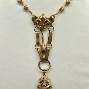 Vintage chatelaine with decorative fleur de lis brooch and black glass fob upcycled necklace