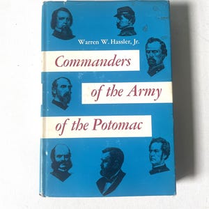 May include: A blue book cover with the title "Commanders of the Army of the Potomac" by Warren W. Hassler, Jr. The cover features portraits of several military leaders.