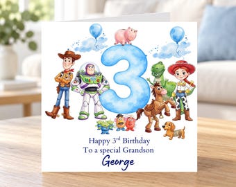 May include: A square birthday greeting card featuring a large blue number 3 surrounded by Toy Story characters including Woody, Buzz Lightyear, Jessie, Rex, Bullseye, Hamm, Slinky Dog, and Mr. and Mrs. Potato Head. Text reads: Happy 3rd Birthday To a special Grandson George.