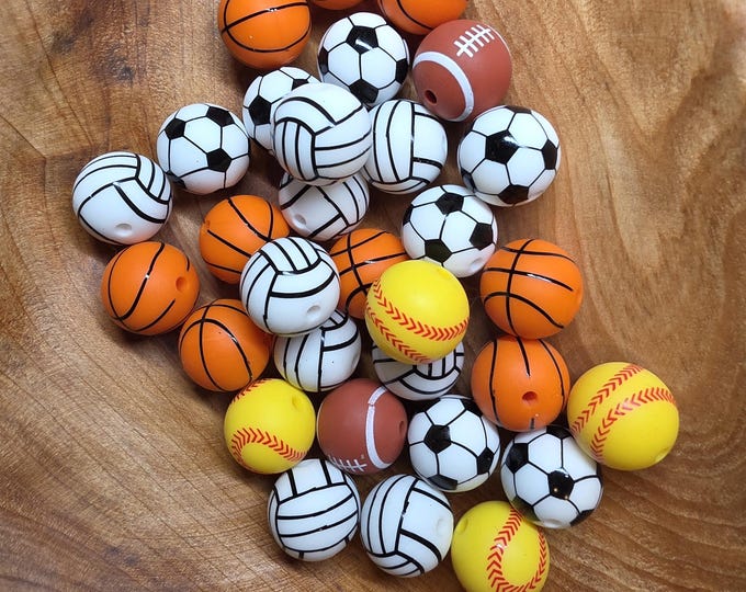 Sports Balls print 15mm Silicone Beads for Crafting and Jewelry. Comes in basketball, volleyball, soccer, Softball, football, baseball.