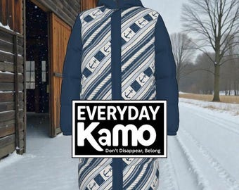May include: A navy blue winter coat with a hood. The coat features a white and navy blue striped pattern with anchor designs. The text "EVERYDAY Kamo" is displayed on the front of the coat, with the tagline "Don't Disappear, Belong."