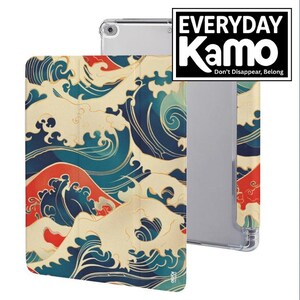 May include: A tablet case with a Japanese wave pattern in shades of blue, red, and cream. The case is open, revealing the tablet inside. The text "EVERYDAY Kamo" is in a black and white box.