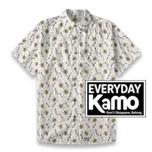 May include: White short-sleeve button-down shirt with a repeating pattern of bees and lavender sprigs. The shirt has a single chest pocket and the text "EVERYDAY Kamo Don't Disappear, Belong" in a black and white rectangle.