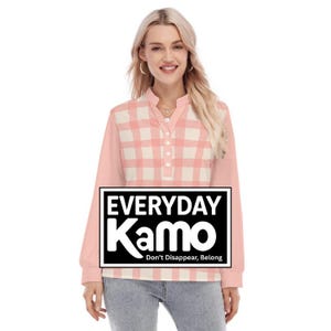 May include: A pink long-sleeve shirt with a light pink and white plaid pattern on the front. The shirt has a mandarin collar and a button-down placket. The text "EVERYDAY Kamo" is displayed in a black rectangle.