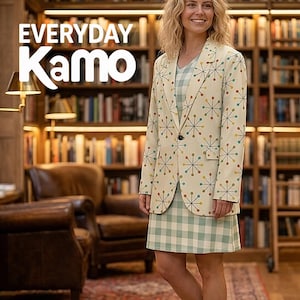 May include: A cream-colored blazer featuring a multi-colored starburst pattern worn over a light green and white gingham dress. The text "EVERYDAY Kamo" is visible in the upper left corner of the image, set against a library background.