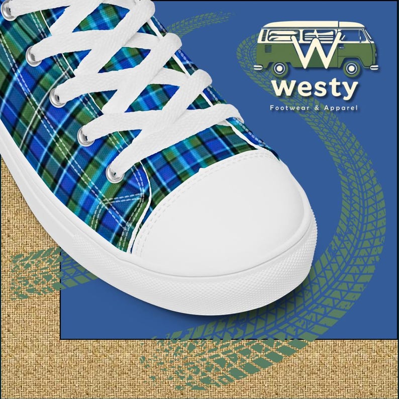 May include: White canvas low-top sneakers with blue, green, and white plaid pattern. The shoes have white laces and a white rubber sole. The brand name "Westy Footwear & Apparel" is visible in the background.