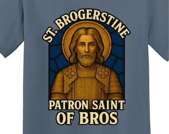 May include: Blue t-shirt featuring a religious-style graphic with the text "ST. BROGERSTINE PATRON SAINT OF BROS." The graphic depicts a man with a halo, in a stained-glass window design. The brand name "FakeSaintShop" is at the bottom.