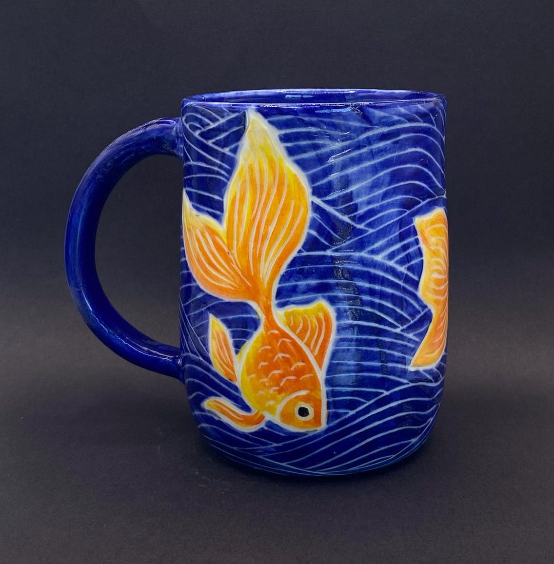 A Goldfish Mug With Blue Background - Etsy