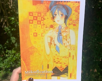 May include: A book titled "Mikufication" with a vibrant illustration of a character with blue hair and a yellow and orange background. The cover features the text "A Community Zine" and "Curated By Dorian_Room".