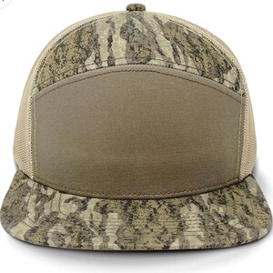 May include: A brown and tan camouflage baseball cap with a mesh back and a solid brown front panel. The cap has a curved brim.