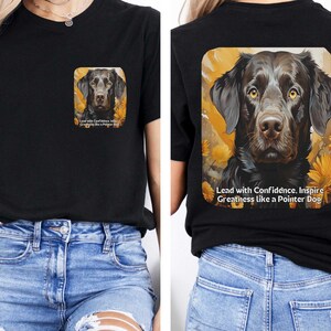 May include: Black t-shirt featuring a detailed illustration of a Pointer dog with text that reads "Lead with Confidence. Inspire Greatness like a Pointer Dog." The design is on the front and back of the shirt.