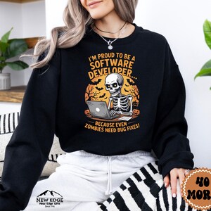 Unisex Halloween Sweatshirt - "I’m Proud to be a Software Developer… Because Even Zombies Need Bug Fixes!"