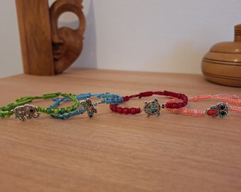 Macrame bracelets with animal charms