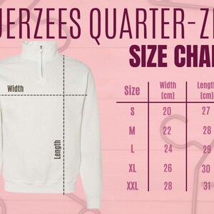 May include: A white Jerzees quarter-zip sweatshirt with a size chart. The chart shows measurements in centimetres for sizes S to XXL, including width and length. The text "JERZEES QUARTER-ZIP SIZE CHART" is at the top.