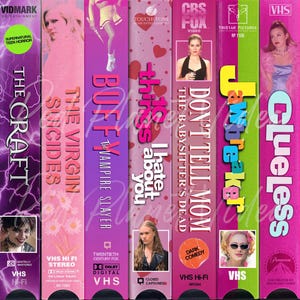 May include: A collection of six VHS tapes with pink and purple backgrounds. The titles are "The Craft", "The Virgin Suicides", "Buffy the Vampire Slayer", "10 Things I Hate About You", "Don't Tell Mom the Babysitter's Dead", and "Clueless".