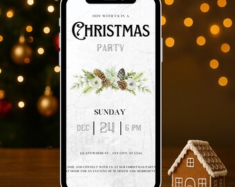 May include: A smartphone displays a Christmas party invitation with text and festive decorations. The invitation includes the words "Christmas Party" and details for December 24th at 6 PM. A gingerbread house sits on a wooden surface.