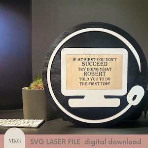 May include: A black and white computer monitor with a wooden frame and a mouse. The monitor displays the text "If at first you don't succeed, try doing what Robert told you to do the first time".