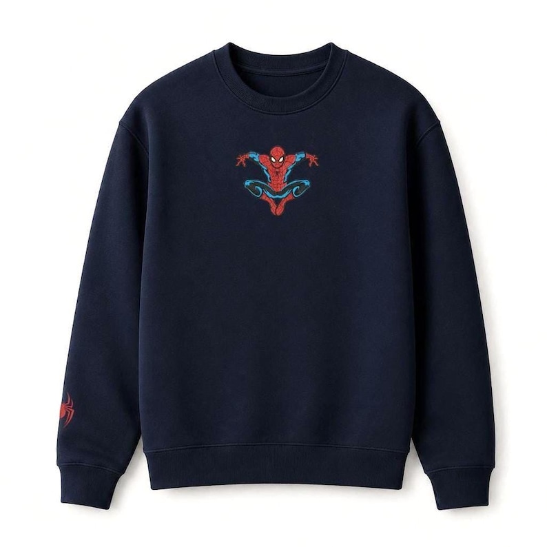 May include: Navy blue sweatshirt featuring a Spider-Man graphic in red, blue, and black. The superhero is depicted in a dynamic pose. A smaller Spider-Man logo is on the left sleeve. This sweatshirt is perfect for fans of the Marvel comic book character.