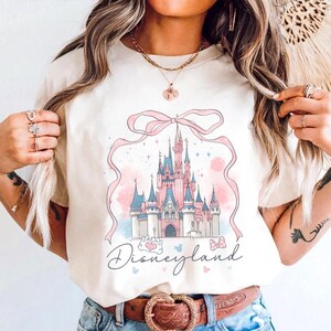 Comfort Colors® Cute Disneyworld Castle Coquette Bow Comfort Colors Shirt, Disneyworld Shirt, Disney Girl Trip Shirt,  Disney Vacay Tee