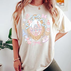 Comfort Colors® Coquette Bow Disney Castle Shirt, Magic Kingdom Girly Disney Girl Trip Shirt, WDW Disneyland Birthday Girl,Fantasia Baby Tee