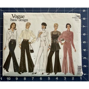 May include: A vintage Vogue Basic Design sewing pattern. The pattern features illustrations of five different flared pants and top outfits. The pattern number is 1240, with sizes 6-8-10. The Vogue logo is at the top.