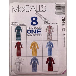 May include: A McCall's sewing pattern featuring eight robe designs. The pattern includes various styles, from floral prints to striped patterns, with sizes small, medium, and large. The package has the text "Great Looks One Easy Pattern".