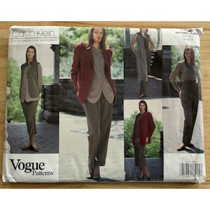May include: A vintage Vogue Patterns sewing pattern featuring Calvin Klein designs. The pattern includes images of a woman wearing a blazer, pants, and a skirt. The pattern size is 8-10-12.