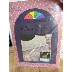 May include: A package for an "Allison's Dress" sewing pattern by Dianne Durand. The package features a pink background with a rainbow design and the text "An English Smocking Art Pattern". The pattern is for girls' sizes 1 through 8.