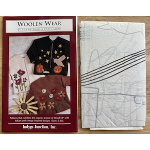 May include: A book cover for "Woolen Wear" by Cathy Pendleton, featuring images of decorated jackets. The jackets have floral, star, pumpkin, and bird designs. The book also includes a pattern sheet with a gray and white design.