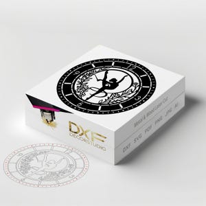 May include: A black and white clock design featuring a silhouette of a dancer with a ribbon. The clock face is surrounded by a wreath of leaves and flowers. The text "DXF DECORSTUDIO" and "Metal & Wood Laser Cut" are visible on the box.