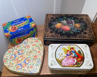 Collectible Vintage Tin Storage Candy Containers – includes all 4. Stand not included-only used as display.