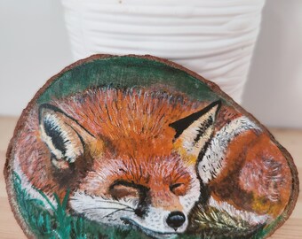 Sleepy Fox painted wood slice.