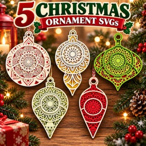 May include: Five layered Christmas ornament SVG designs featuring intricate mandala-style cutouts. The ornaments are displayed in red, white, yellow, and green colors with detailed geometric patterns and hanging loops at the top of each piece.