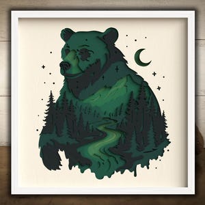May include: Framed art print depicting a green bear with a forest scene within its outline. The artwork includes a crescent moon, stars, and a winding river. The bear is set against a cream background.