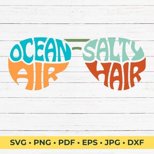 This design features the words Ocean Air Salty Hair, creatively made into the shape of sunglasses.