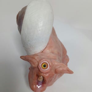 Babbaluci creature sculpture