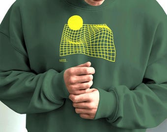 May include: A dark green sweatshirt with a yellow graphic design featuring a grid and a circle. The word "void" is printed below the graphic. The sweatshirt is part of the "Threaded" collection.