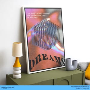 Art print hung above a black console table, featuring warped 3D grid lines and typographic surrealism on a glowing, colorful background.