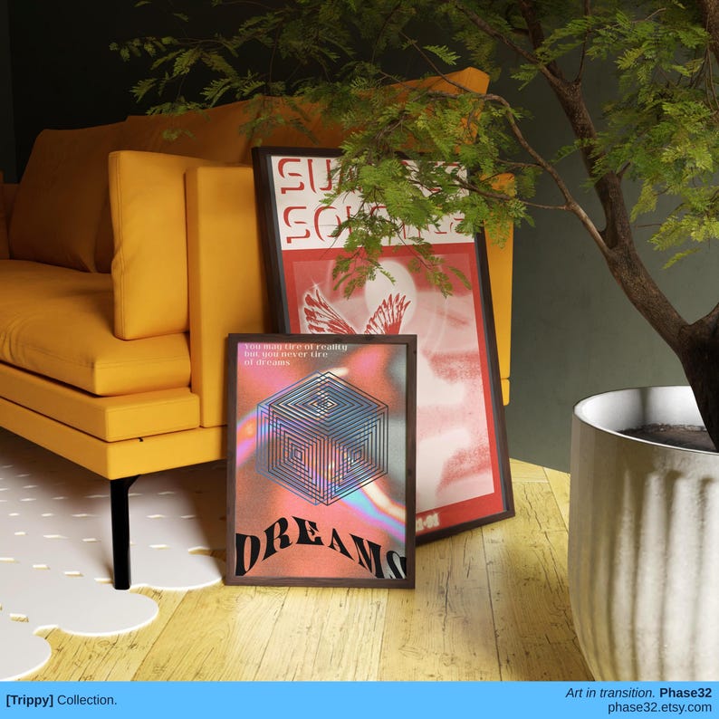 Unframed poster print leaning against a yellow chair and white planter, surrounded by plants in a cozy, artistic living space.