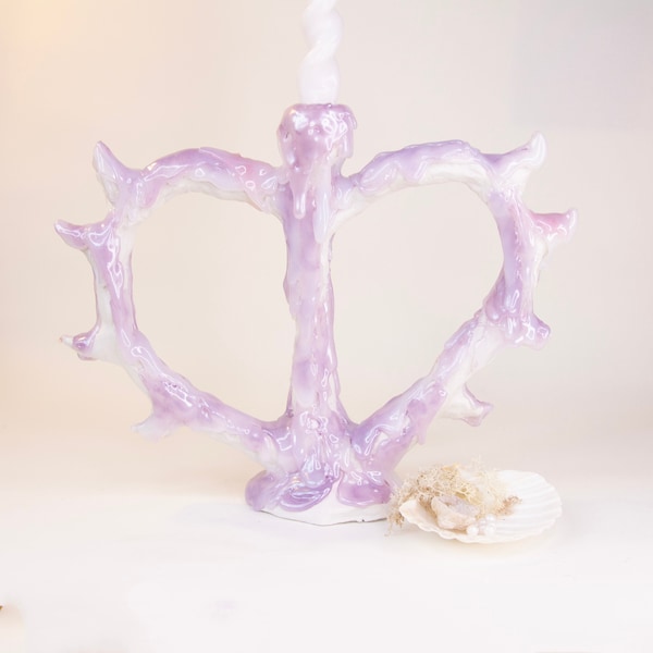 candle holder with abstract heart form melting decor soft metallic pastel ethereal serene pink spike gargoyle