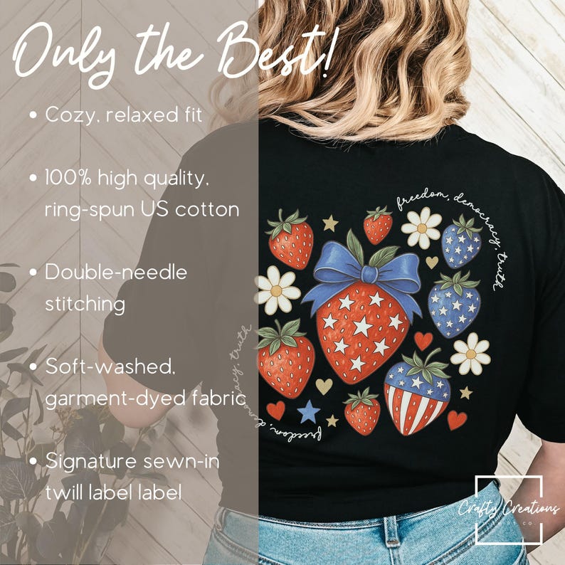 May include: Black t-shirt featuring a patriotic strawberry design with stars and stripes, surrounded by flowers and hearts. The text "freedom, democracy, truth" is arched above the design. The shirt has a relaxed fit and is made of soft, garment-dyed fabric.