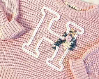 Hand-embroidered cotton sweater with custom letter silhouette