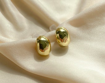 Ohrringe in Perlenform Gold