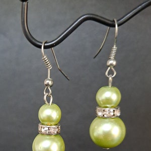 Vintage light green pearl style drop earrings  set in silver tone