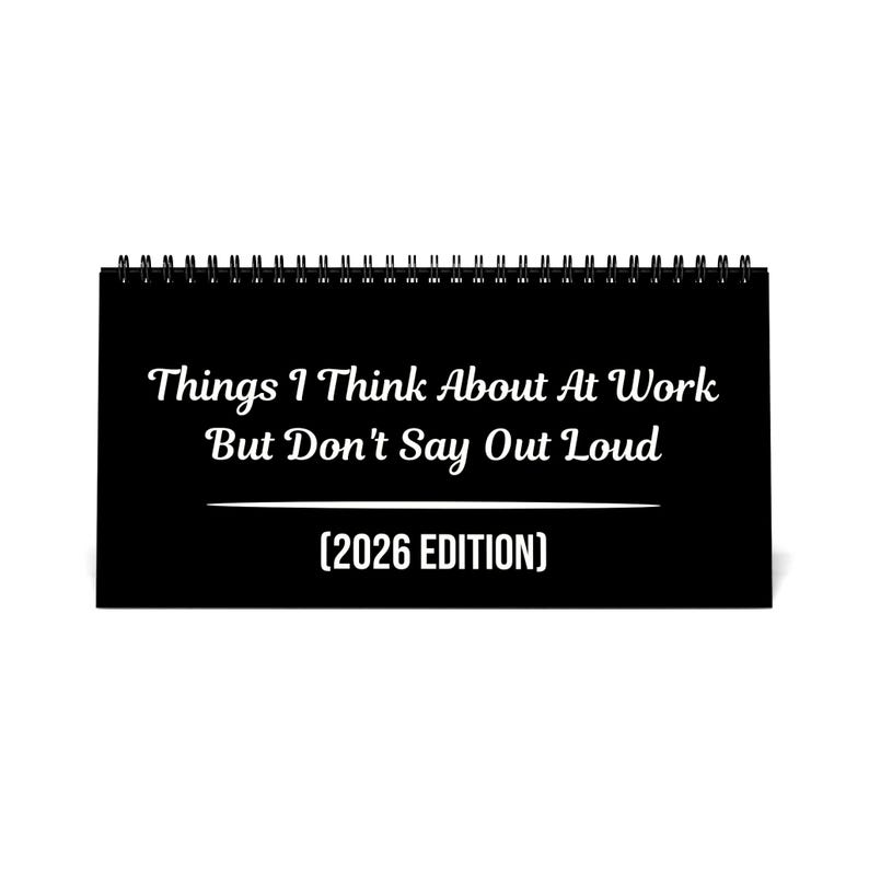 May include: A black desk calendar with a spiral binding. The cover features white text that reads "Things I Think About At Work But Don't Say Out Loud (2026 EDITION)".