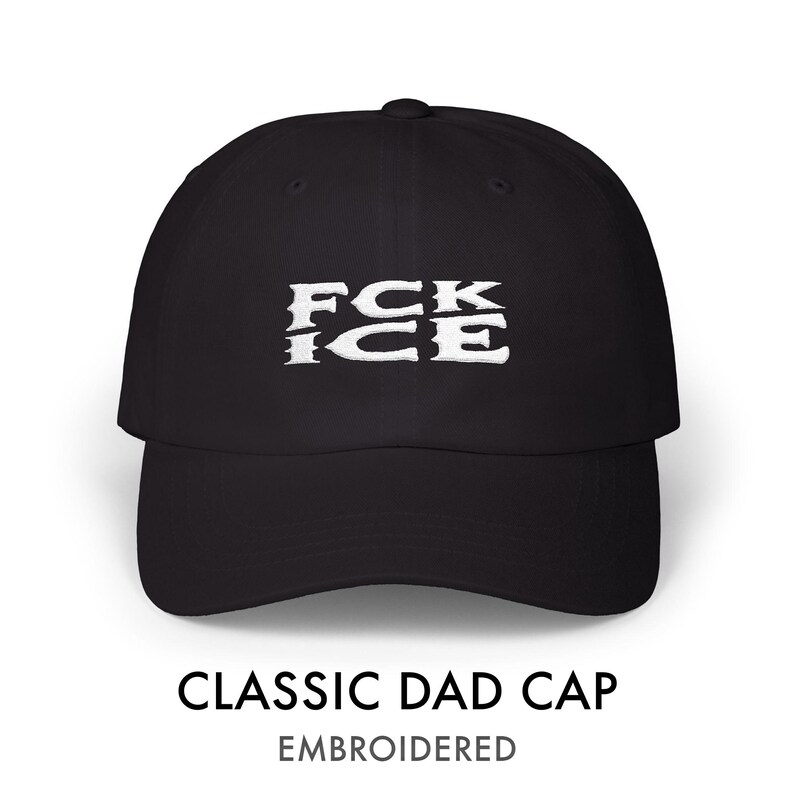 May include: Black classic dad cap with the embroidered text "FCK ICE" in white. The cap has a curved brim and a structured fit. The text "CLASSIC DAD CAP" and "EMBROIDERED" are displayed below the cap.