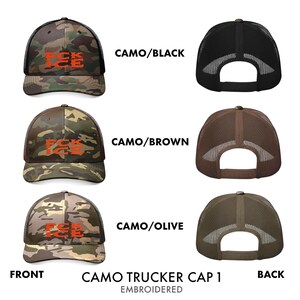 May include: Camo trucker caps in black, brown, and olive green. Each cap features a camouflage pattern with the embroidered text "FCK ICE" in orange. The back of each cap has a mesh design.
